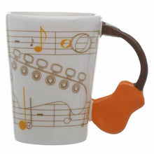 Load image into Gallery viewer, Guitar Mug With Guitar Shaped Handle and  With A  Sheet Music Design